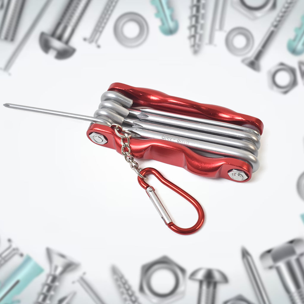 Person holding the 8-in-1 bike repair tool for scale & portability