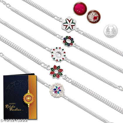 A beautifully arranged Rakhi Combo gift set featuring a designer Rakhi, roli chawal, a coin, chocolate, and a greeting card.