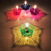 An illuminated plastic reflection diya creating a warm, inviting glow for any occasion.