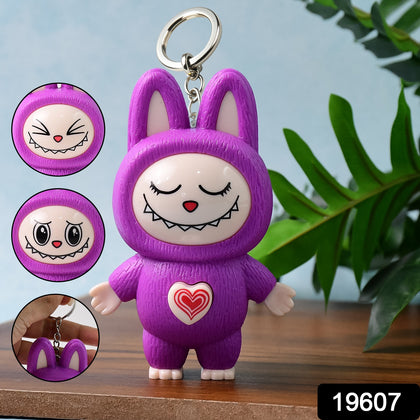 Cute cartoon character face changing keychain with happy expression