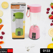 Portable USB electric juicer with 6 blades, shown with fruit for smoothies