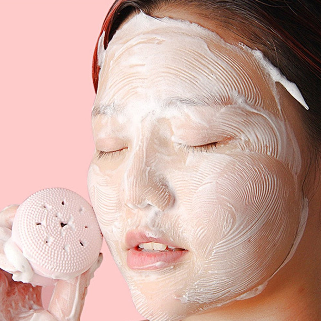 Close-up of octopus-shaped silicone facial brush