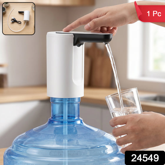 A person's hand operates a white and black electric water dispenser, filling a glass from a large blue bottle. The inset