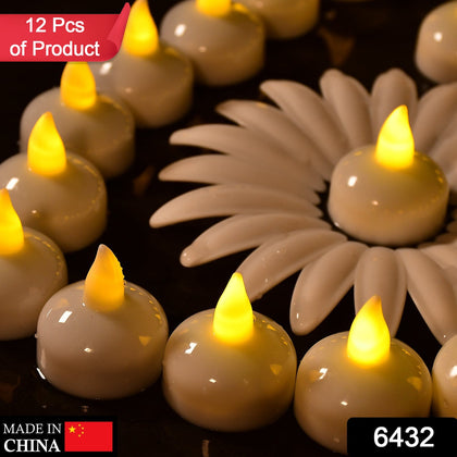 12 Pcs Floating LED Tealight Candles illuminating a water bowl centerpiece