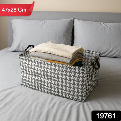 Foldable Fabric Storage Box in a houndstooth pattern, open and ready for use.