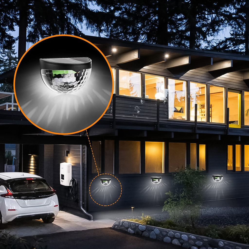 Compact half-round solar fence light glowing warmly