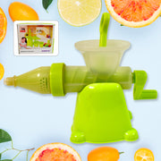 Disassembled lime green and translucent manual juicer parts on a light background with various fruits and vegetables.