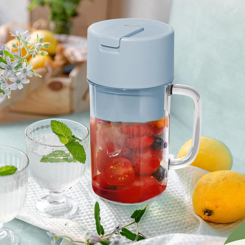 The electric juicer disassembled, illustrating how easy it is to clean after use.