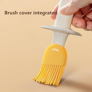 Hand using the oil dispenser brush for cooking on a stove