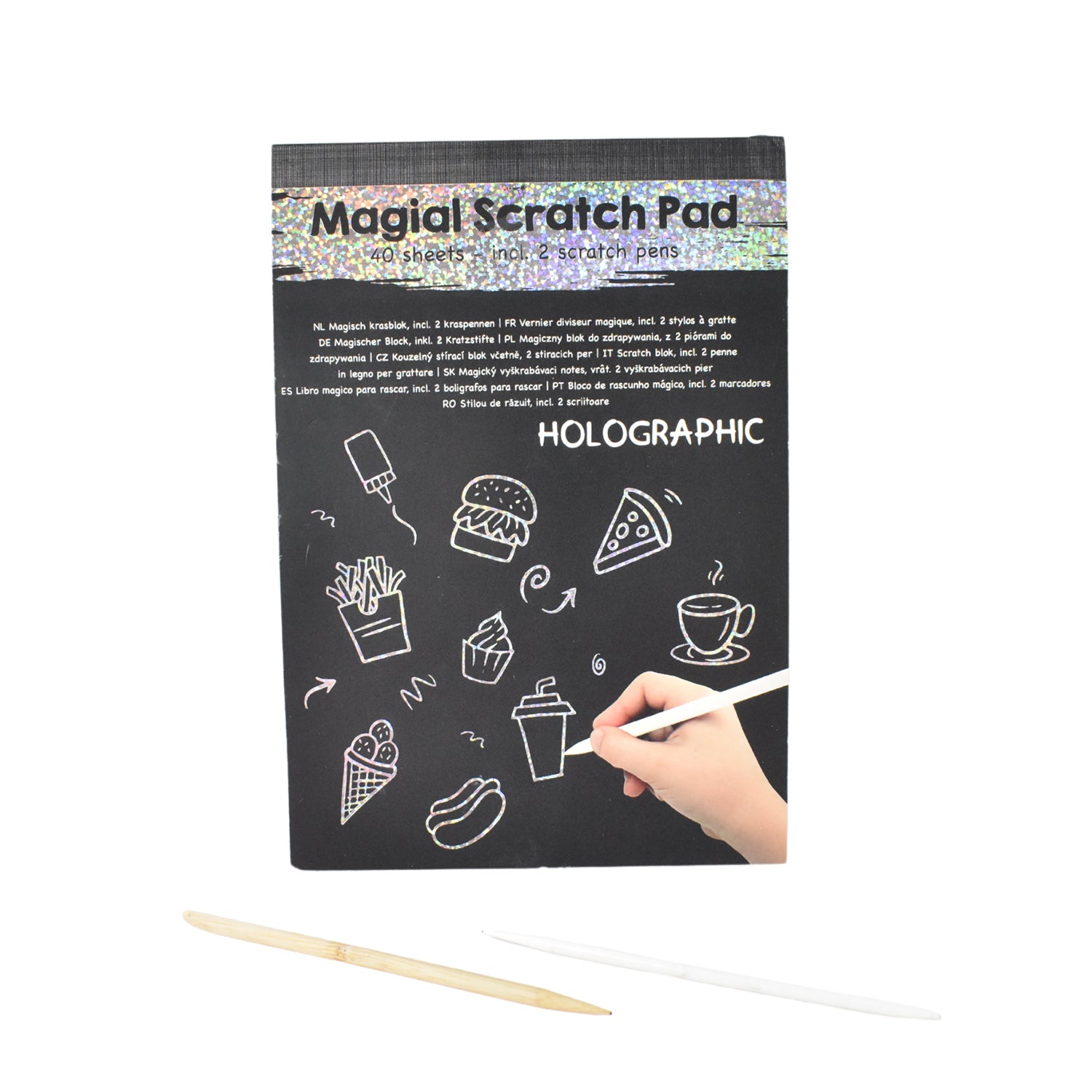 Wooden stylus next to scratch art sheets showing colorful artwork