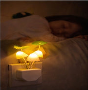 Mushroom night light plugged into a wall outlet