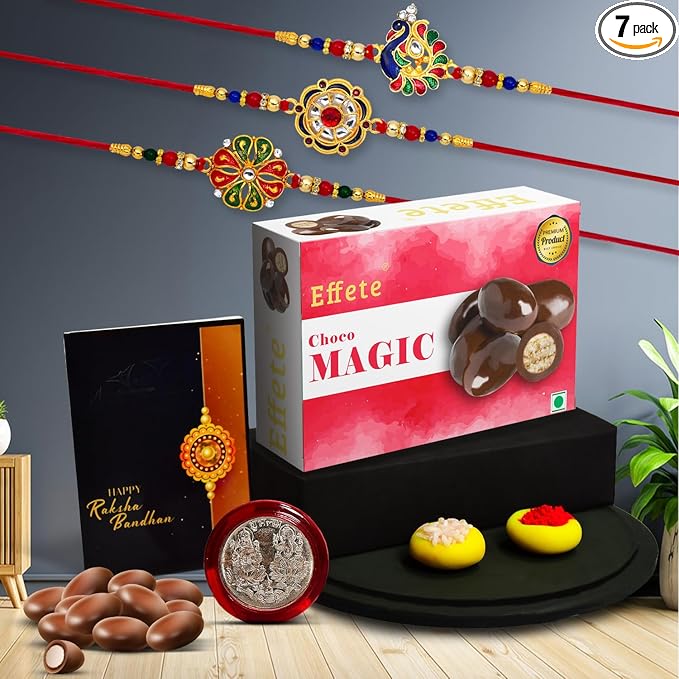 Complete Rakhi Combo Gift Set with fancy Rakhi, chocolates, tilak, and pooja coin.