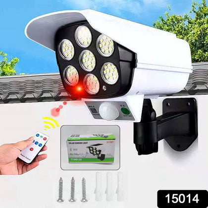 Solar motion sensor security camera shaped dummy wall light