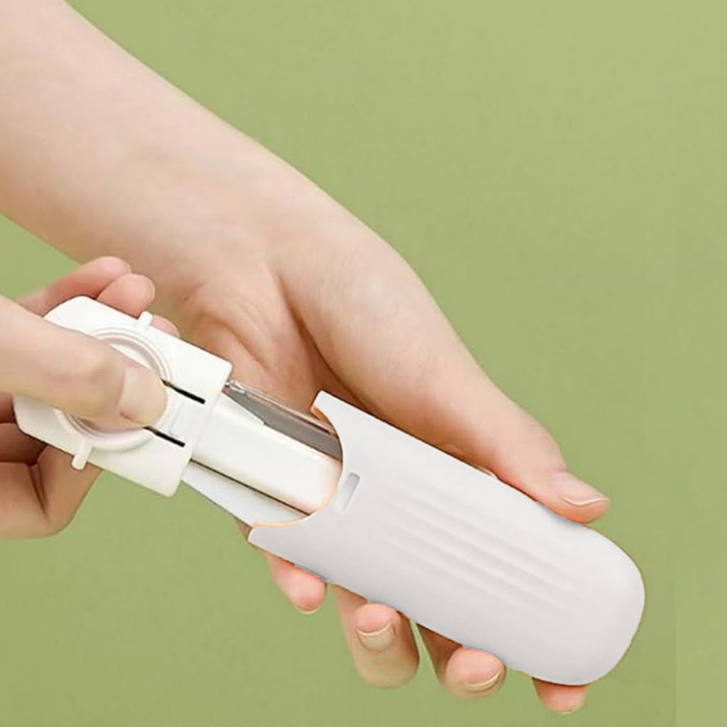 Close-up of the peeler side of the Dual-use Knife Peeler, ready for vegetable preparation.
