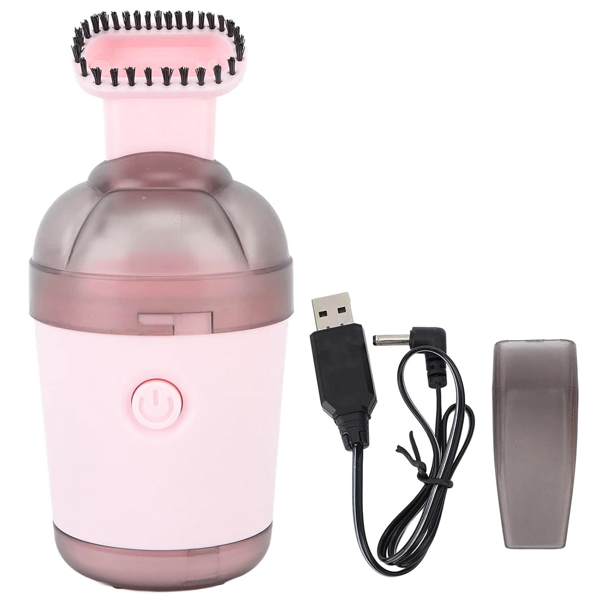 Underside view of desktop vacuum showing brush and suction port