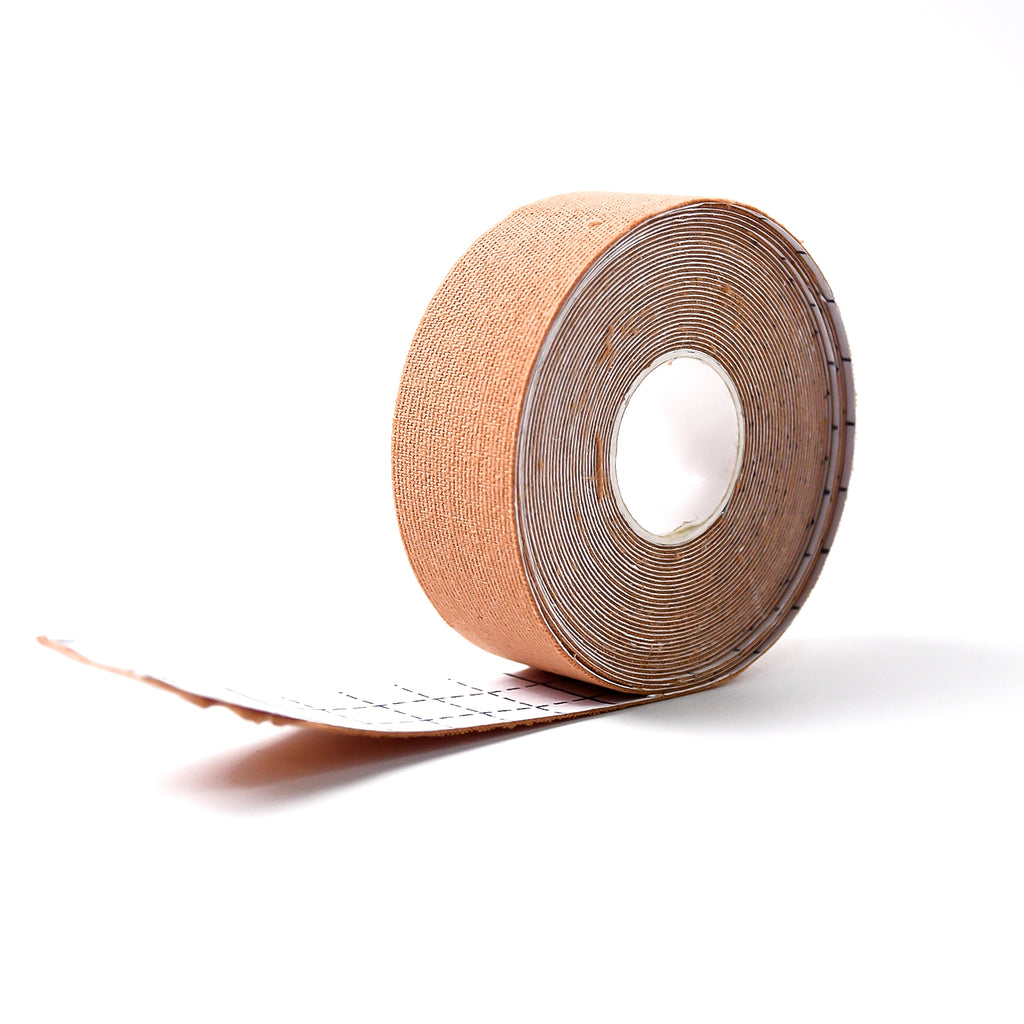 Hand holding a roll of myofascial face lifting tape.