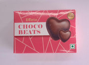A close-up, top-down view of the red Effete Choco Beats box with two heart-shaped chocolates depicted on its front.