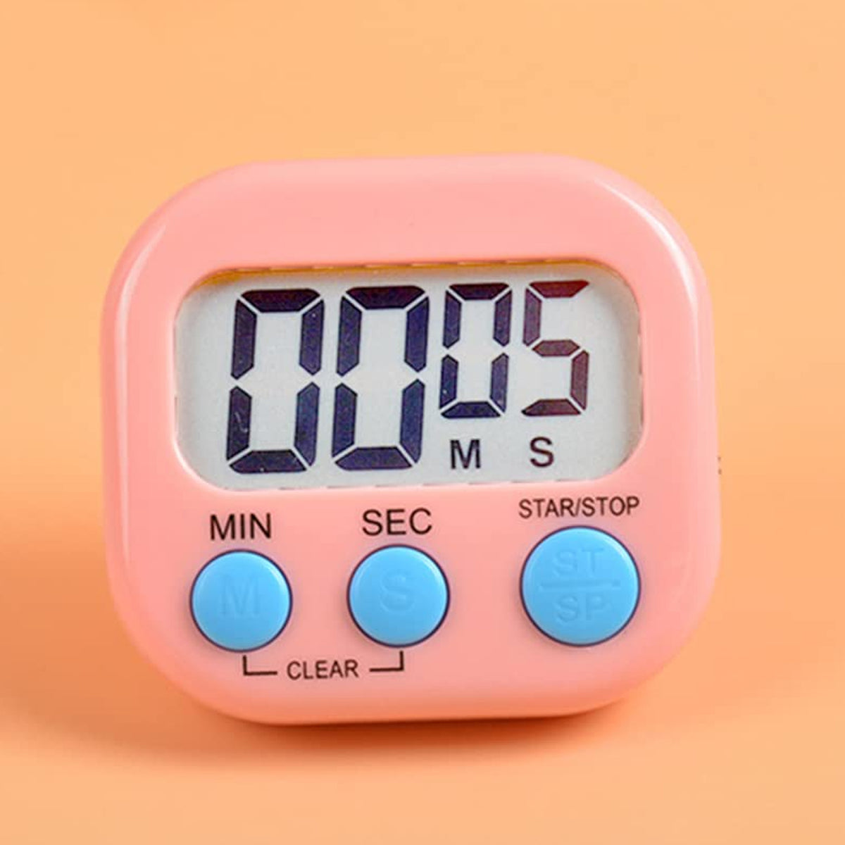 White digital kitchen timer on a counter, ready for cooking