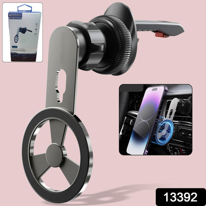Magnetic phone holder mounted in a car air vent