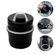 Close-up of portable car ashtray interior with active blue LED light