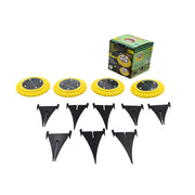 Four yellow solar ground lights with black plastic stakes and a green product box on a white background.