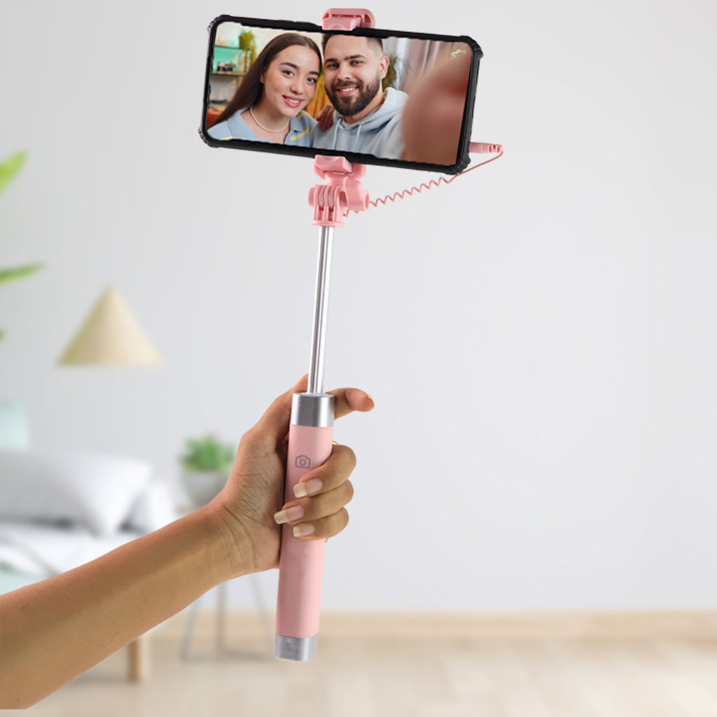 Selfie stick extended showing telescopic rod and adjustable clamp