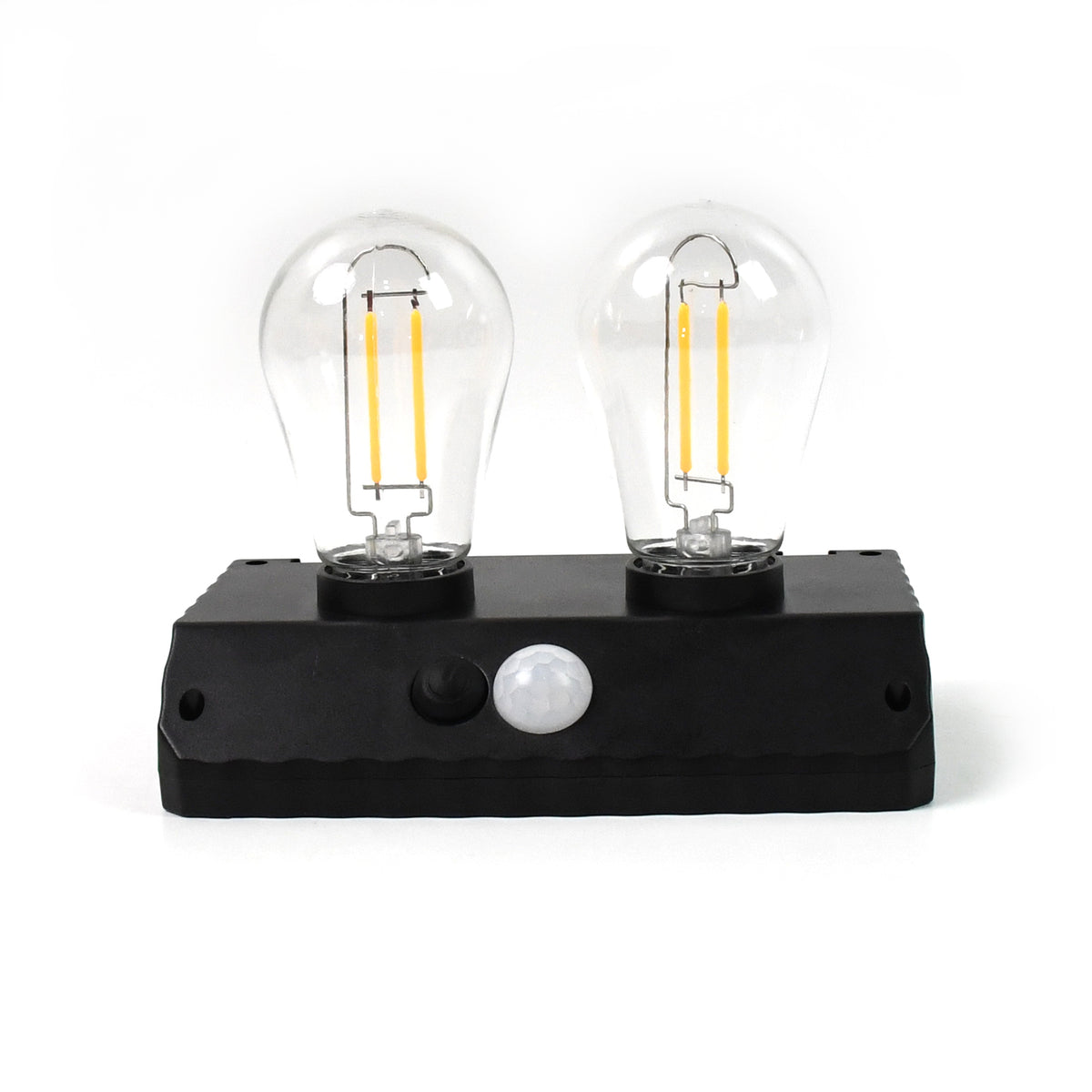 Solar double LED lamp illuminating a garden path