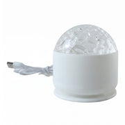 Side view of a white dome projection light with a clear textured top and a white USB cable.