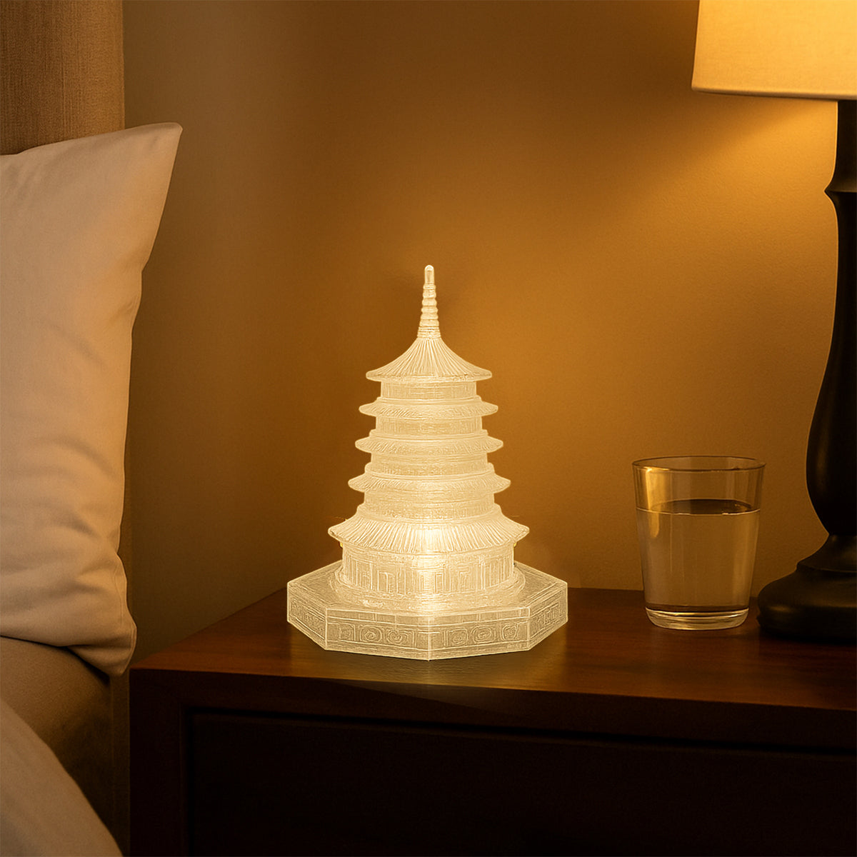 LED crystal pagoda lamp styled with other home decor items