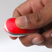 Close-up of key finder with LED light on