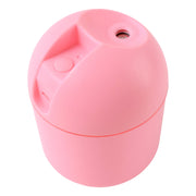 USB mini air humidifier emitting cool mist for improved air quality