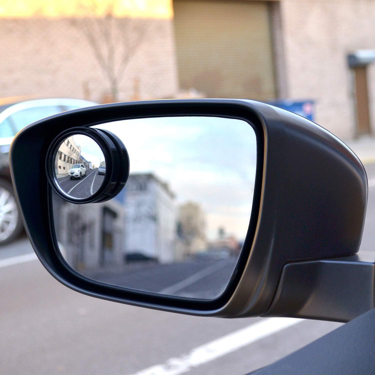Car side mirror with attached frameless blind spot mirror
