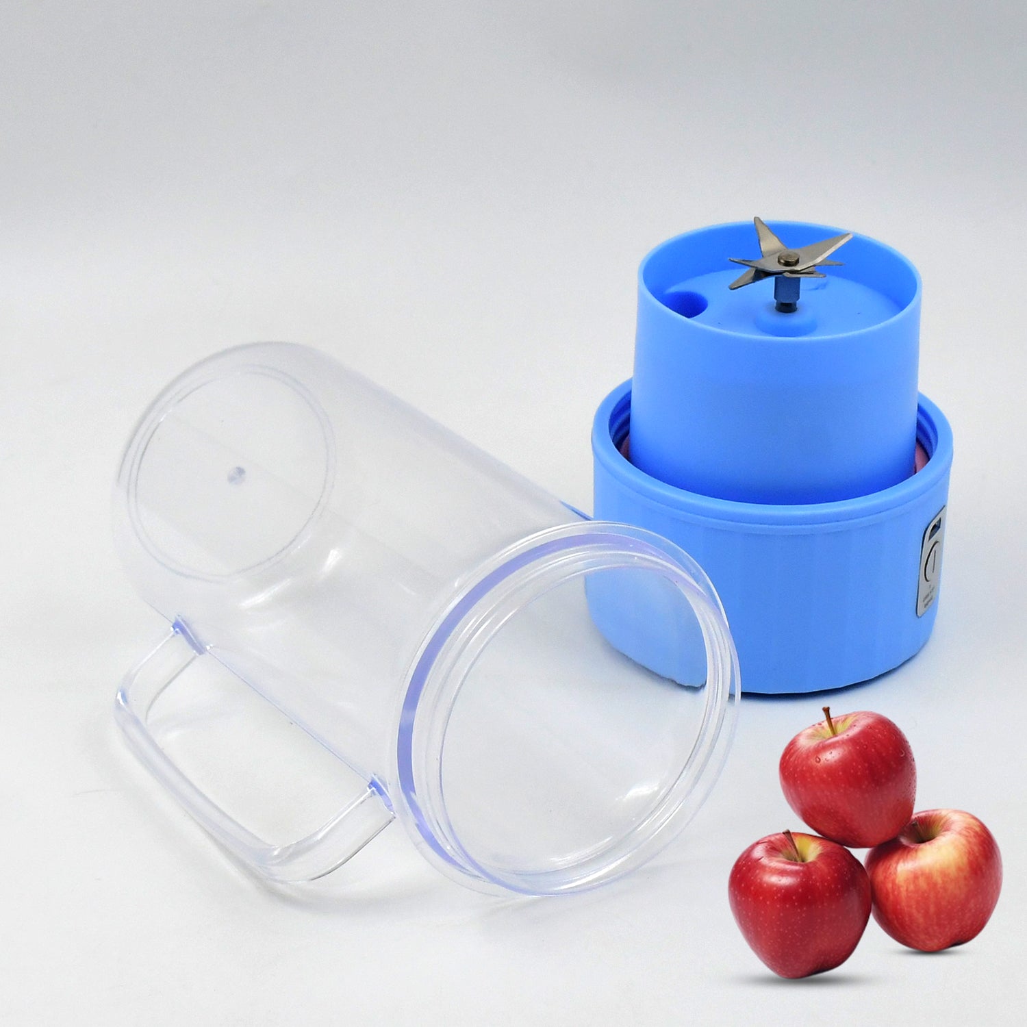 A detailed view of the portable electric juicer's safety lock and USB charging port.