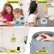 Compact digital kitchen timer held in hand, showing portable size