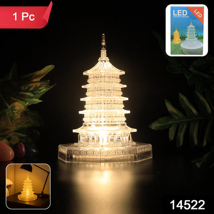 LED Crystal Pagoda Light emitting a warm, soft glow on a table