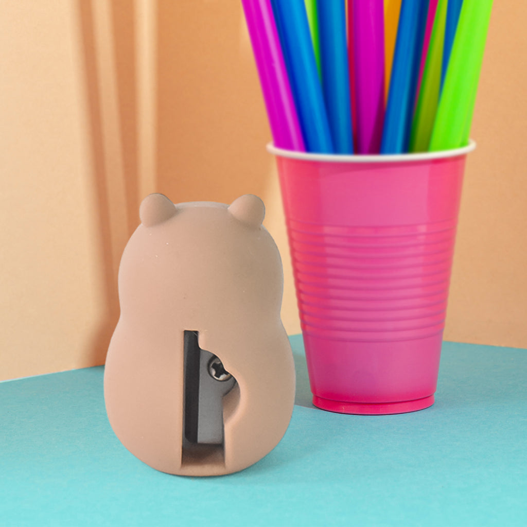 Assorted cartoon pencil sharpeners with erasers in various designs