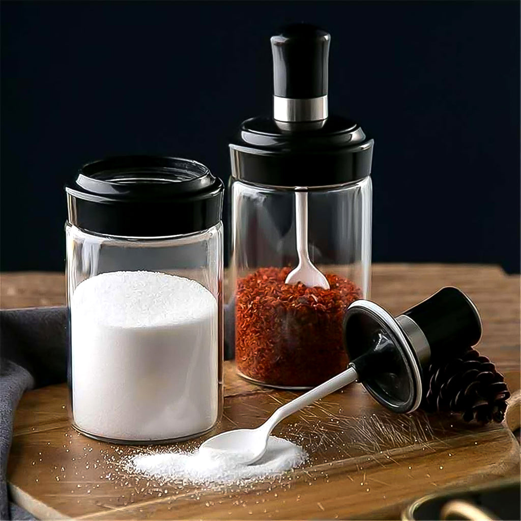 Rotating airtight lid on 250ml glass storage jar with built-in spoon