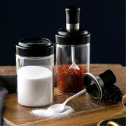 Rotating airtight lid on 250ml glass storage jar with built-in spoon