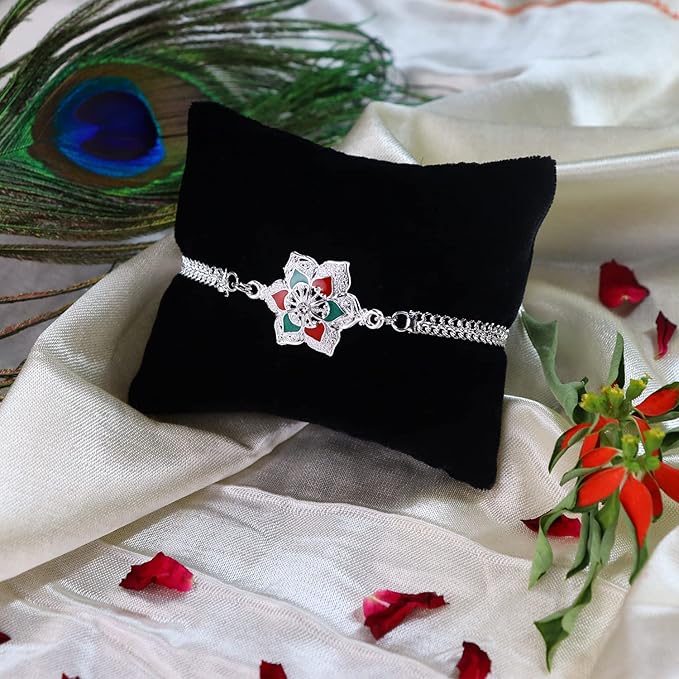 Close-up of an intricately designed Rakhi for brother, adorned with stones and embellishments.