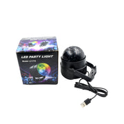 Compact LED disco ball light from an angled perspective