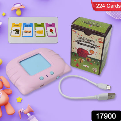 Child using interactive English learning machine with flash cards