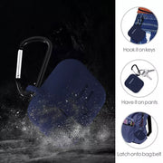 Navy blue earbud case with a black carabiner clip, shown with dust or water splashing around it.